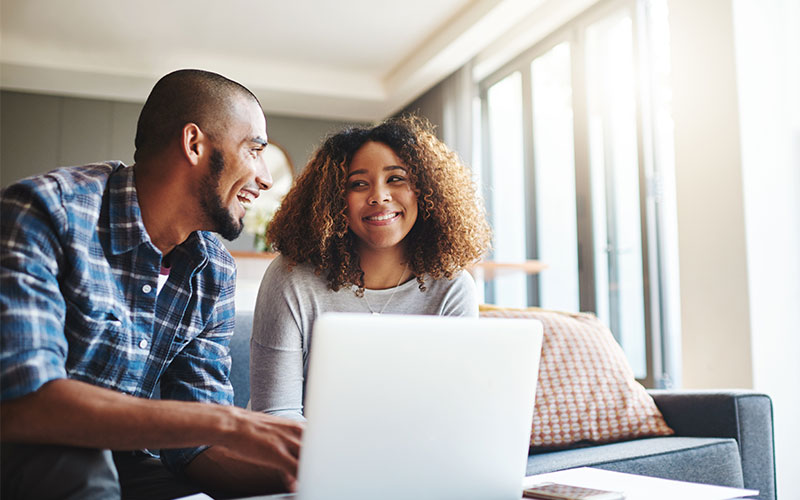 Couple using computer